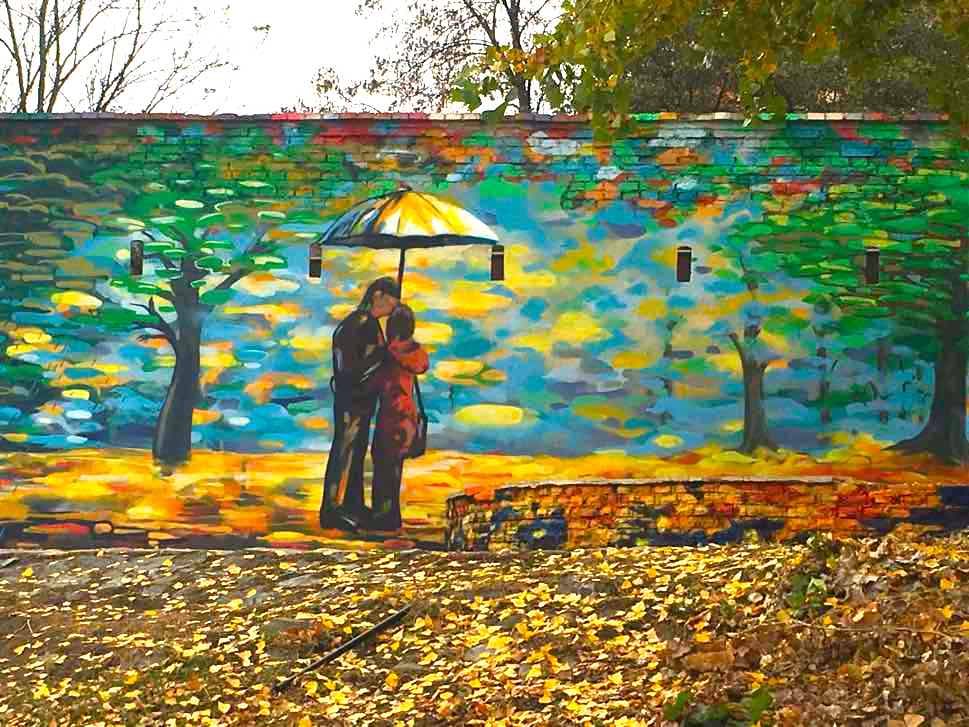 Mural of couple under umbrella