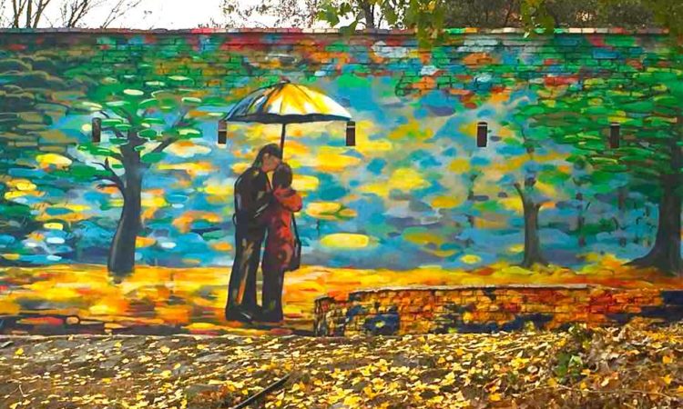 Mural of couple under umbrella