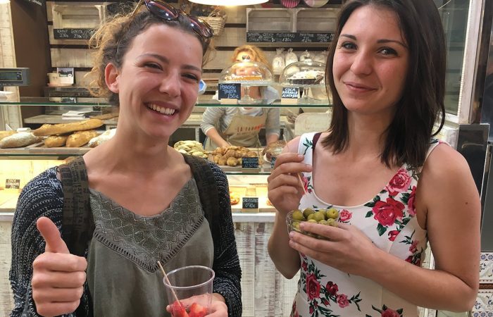 Young expat women in market