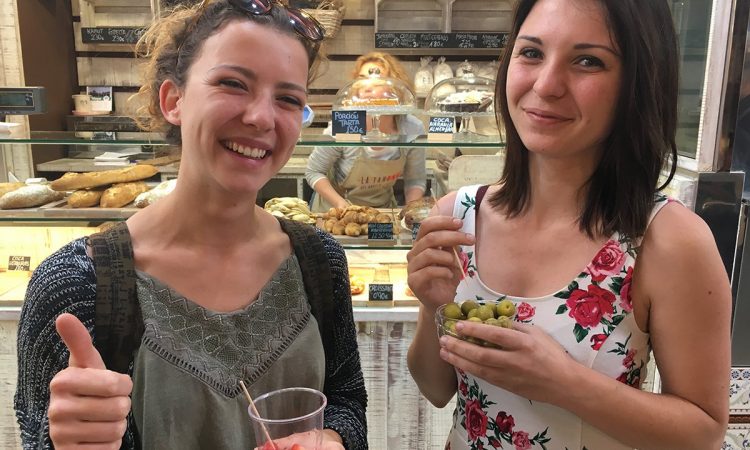 Young expat women in market